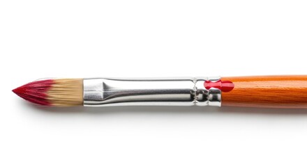 Fototapeta premium Close up of a paintbrush with red paint on its bristles