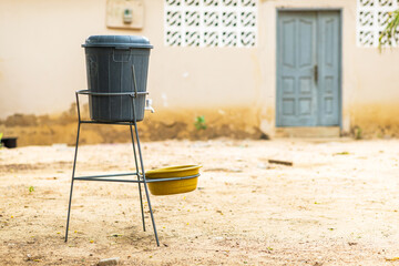 Veronica bucket used for handwashing and hygiene in Africa © Roger