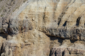 Columnar-jointed lava flow in the wall of the Yellowstone River canyon. Sediments and basalts of The Narrows ( Pleistocene ). Calcite springs overlook, Yellowstone National Park , Wyoming. 
