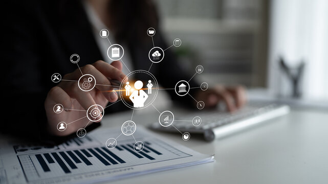 A concept of centralized business management and corporate strategy. A leadership team connecting to all functions like finance, operations, and planning. Motif