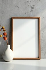 Modern Minimalist Blank Frame Mockup with Autumnal Branch in Vase Against Textured Wall