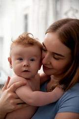 Cherished moments between mother and baby showcasing love, connection, and tenderness in a warm, cozy environment emphasizing family bonding concept
