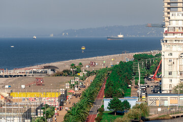 Batumi, Georgia - November 2023: Ardagani Lake, singing fountain, skyscrapers and Batumi beach