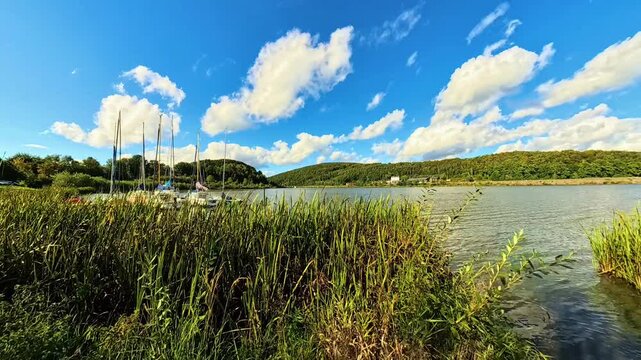 4K Timelapse video with moving clouds and reflections at Lake Drachensee, Furth im Wald, Cham, Bavarian Forest, Bavaria, Germany