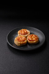 Round fish or chicken cutlets baked with tomato and cheese. Fish cutlets