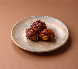 Fried chicken legs with teriyaki sauce, oven baked meat. Chicken legs