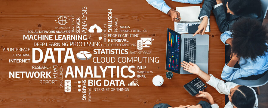 This image depicts a collaborative workspace where a diverse team engages in discussions on data analytics, machine learning, and cloud computing, showcasing modern technology integration. Amity