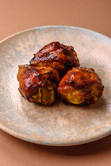 Fried chicken legs with teriyaki sauce, oven baked meat. Chicken legs