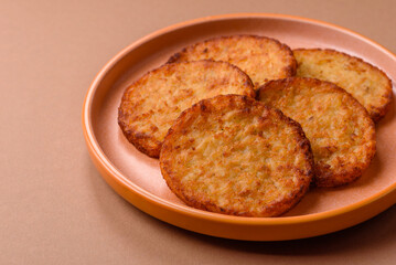 Potato hash browns, a cooked vegetable breakfast food. Potato hash brown