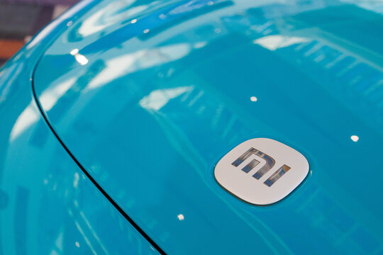 Warsaw, Poland &ndash; October 4, 2025: Detailed close-up of Michelin tire on the Xiaomi SU7 electric car showing the wheel design and logo.