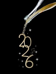 Golden champagne pours from a bottle, forming the shimmering numbers “2026” against black — a sparkling, celebratory toast to the coming year with festive glitter and elegance.