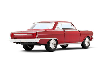Fototapeta premium Rear and partial left side view of a red colored musscle model toy car photographed on a transparent background.