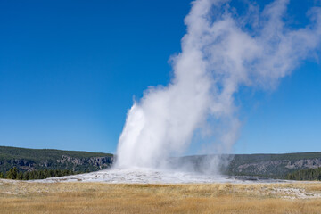 Old Faithful is a cone geyser in Yellowstone National Park in Wyoming, United States. Hydrothermal System. The Yellowstone Caldera / Yellowstone Plateau Volcanic Field. Yellowstone hotspot. 