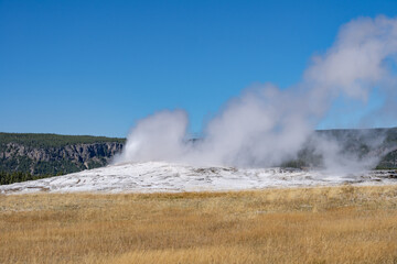 Old Faithful is a cone geyser in Yellowstone National Park in Wyoming, United States. Hydrothermal System. The Yellowstone Caldera / Yellowstone Plateau Volcanic Field. Yellowstone hotspot. 