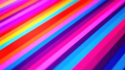 Vibrant diagonal stripes create a dynamic and colorful abstract background, showcasing a spectrum of bright hues.