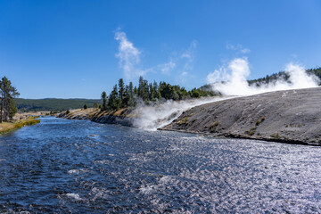Firehole River Bridge, Midway Geyser Basin Trail. Yellowstone National Park , Wyoming. Hydrothermal System. hot-spring deposits

