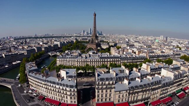 Iconic view of the Eiffel Tower in downtown Paris, France, showcasing the city&rsquo;s skyline and vibrant urban atmosphere.