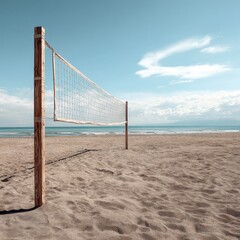 Empty beach volleyball net stands ready for play on a sandy shoreline under a clear blue sky