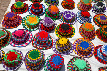 Traditional egyption fez (hats) in various color on display in a local market