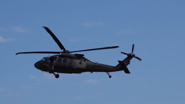 Military helicopter UH-60 in flight