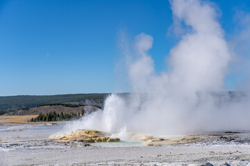 Clepsydra Geyser. Fountain Paint Pot Trail. Lower Geyser Basin in Yellowstone National Park. Hydrothermal System. hot-spring deposits. Extremophile. 
