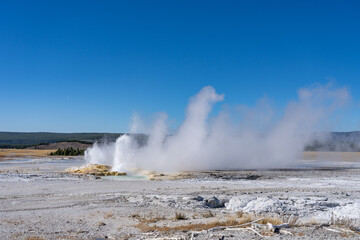 Clepsydra Geyser. Fountain Paint Pot Trail. Lower Geyser Basin in Yellowstone National Park. Hydrothermal System. hot-spring deposits. Extremophile. 
