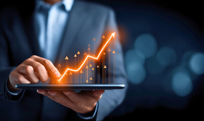 Businessman Using Tablet with Rising Financial Graph