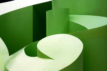 Abstract Green Spiral Architecture: Curved Lime Shapes In Modern Art Installation