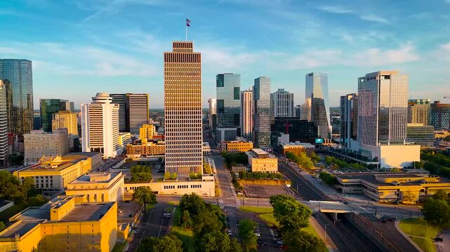 Stunning aerial panorama of Nashville, Tennessee at golden hour featuring downtown skyline, Cumberland River, and urban landmarks&mdash;perfect for tourism, real estate, travel, and lifestyle themes