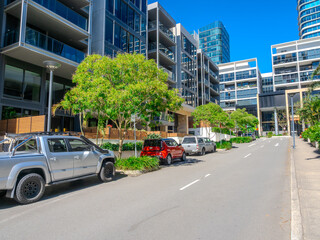 Residential and commercial Apartment building in inner west Sydney suburb , Sydney NSW Australia. Newly built apartment building in Wentworth point with modern Green eco friendly design