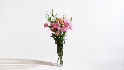 Eustoma flowers bouquet glass vase