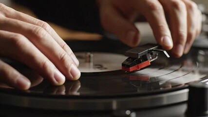 hand of dj playing music