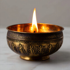 Intricately Designed Metal Oil Lamp with Bright Flame for Religious Worship and Ceremonial Use