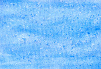 Abstract blue watercolor texture with subtle patterns and soft brush strokes in light and dark shades.