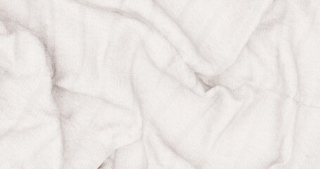 Obraz premium Close-up of soft, crumpled white fabric texture — perfect for minimalist backgrounds, product mockups, or design projects needing cozy, tactile textile feel.