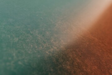 Abstract textured surface with teal and orange gradient and light beam