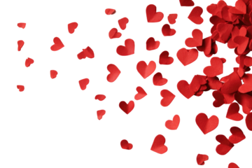 Red paper hearts falling against a stark black background, suggesting love and romance