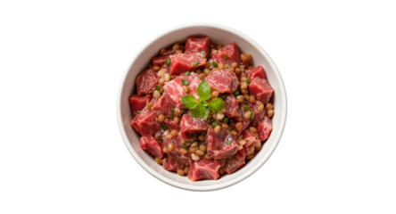 Delicious hearty beef and lentil stew served in a white bowl, isolated on a white background.