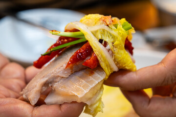 samhap cuisine wrapped with a napa cabbage kimchi