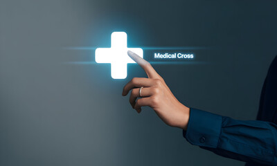 Obraz premium Modern digital healthcare concept with glowing medical cross and hand pointing