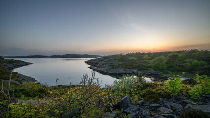 Sunset Over Calm Island Waters