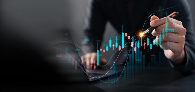 Businessman analyzing stock market data with digital candlestick chart, investment and opportunity concept, trading strategy, financial growth, business and enterprise analysis.
