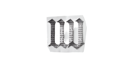 Letter M Shape Cut From Paper with Printed Text