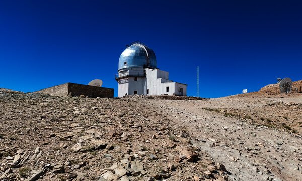 The Indian Astronomical Observatory in Hanle, Ladakh's highest at 4,500m, features a gleaming dome against rugged mountains and clear blue skies, captured in September 2025.