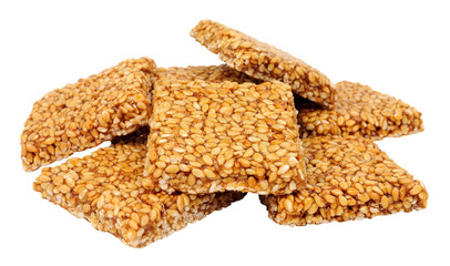 Group of sesame seed chikki traditional Indian sweet snacks isolated on a white background