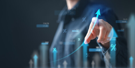A person pointing at a rising arrow graph with financial percentages represents interest rate growth, banking performance, and comparison of annual percentage yield and deposit returns.