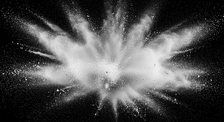 A dynamic explosion of fine white powder scatters outwards against a stark black background forming a cloud of diffuse mist and individual particles