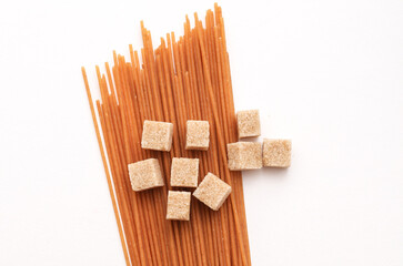 Cane sugar and brown durum wheat paste. Diet, healthy eating, reducing calorie intake concept