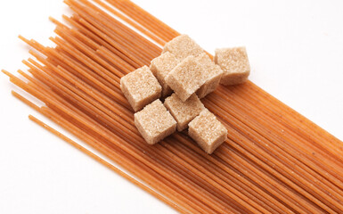 Cane sugar and brown durum wheat paste. Diet, healthy eating, reducing calorie intake concept