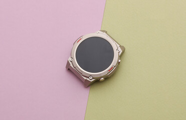Bezel of modern smart watch without strap on pastel background